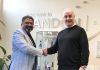 Suhas Kulkarni general manager, Business Development Asia Pacific, Printing Packaging and Converting of DKHS and Stuart Mitchell, Global Sales director, Sandon Global shake hands on their partnership for Asian regions
