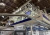 Colines at K demonstrated its 3-meter flat die AllRollEX 3000 cast line each day of the fair between 11am and 3pm producing a 12 micron stretch film Photo Packaging South Asia