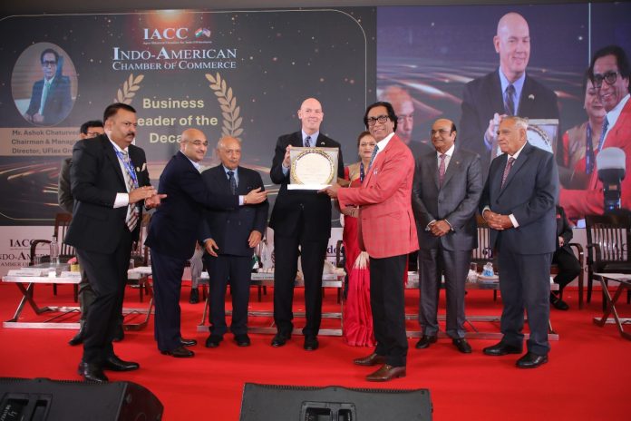 Mr. Ashok Chaturvedi, Founder, CMD, UFlex Limited Being Awarded Business leader of the Decade by Mr. Jorgan K. Andrews, Deputy Chief of Mission at the US Embassy Chaturvedi